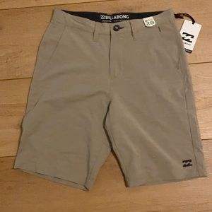 Billabong, tan, somewhat striped men’s shorts, size 28